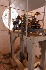 handcrafted antique bell tower clock mechanism from the 19th century that moves 4 clocks, one for each face
