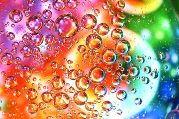 Oil bubbles on top layer of water