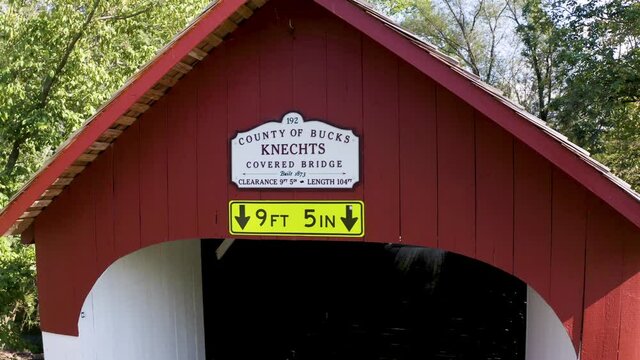 KNECHT'S COVERED BRIDGE IN BUCKS COUNTY, PENNSYLVANIA. BUILT IN 1873. NATIONAL REGISTER OF HISTORIC PLACES.  CROSSES COOKS CREEK. 110ft long 15ft wide.