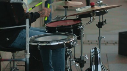 drum set drummer plays cymbals tom bass drum snare hi-hat