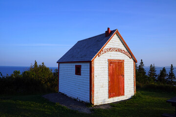 Old shed at lighthouse station at Land's End on Cap-Gaspé in Florillon National Park  