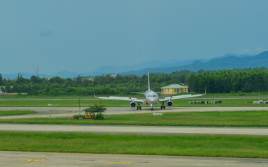 Fototapeta na wymiar Airplane at Da Nang Airport, Vietnam