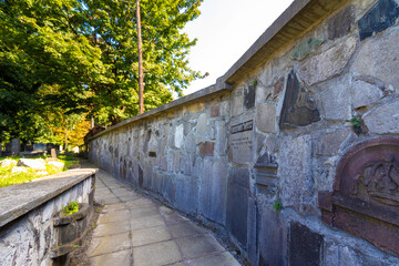 krakow- poland, 03-09-2021. The fence of the new Jewish cemetery in Krakow on Miodowa Street, made of tombstone fragments broken during World War II
