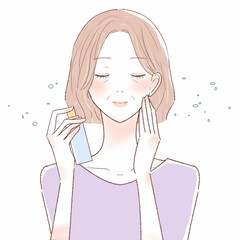 ミストタイプの化粧水を顔にふりかける中年女性