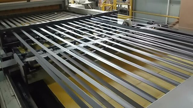 Coloued Paper pulp being processed in a large container for manufacturing paper. Initial stage of making color paper.