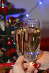 glasses of champagne in the hands people