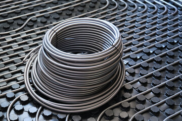 Underfloor surface heating and cooling pipes.