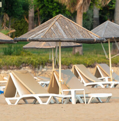 Sun loungers on the beach.
