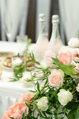 Beautiful floral compositions in the restaurant for the wedding ceremony