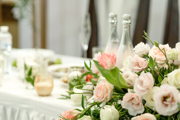 Beautiful floral compositions in the restaurant for the wedding ceremony