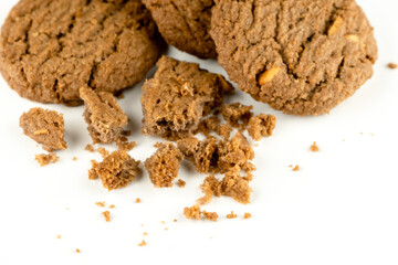 Delicious tasty snack of brown cookies with peanut isolated on white background