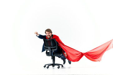 business man with red cloak in the chair hero superman