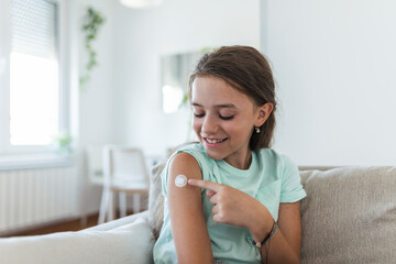 Adhesive bandage on arm after injection vaccine or medicine,ADHESIVE BANDAGES PLASTER - Medical...