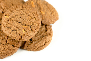 Delicious tasty snack of brown cookies with peanut isolated on white background