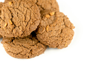 Delicious tasty snack of brown cookies with peanut isolated on white background
