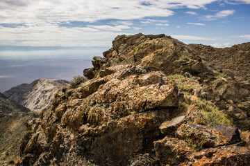 Beautiful Summer scenery: rocky mountains under the blue cloudy sky