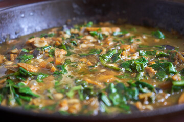Stew of various vegetables in the frying pan