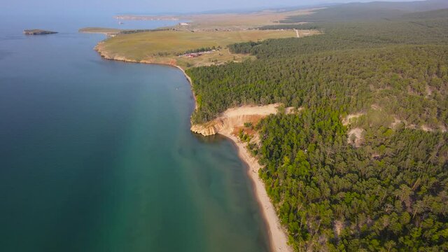 The picturesque shore of the Sarai beach. A trip to Lake Baikal.