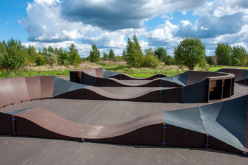 pump track for extreme riding on bicycles, scooters, skateboards and rollerblades, Russia