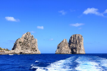 Fototapeta na wymiar The Faraglioni Rocks on the coast of the island of Capri, Italy