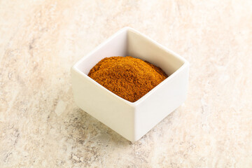 Dry Paprika powder in the bowl