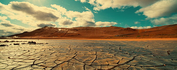 Cracked earth at the site of a dried  lake. Global climate change concept