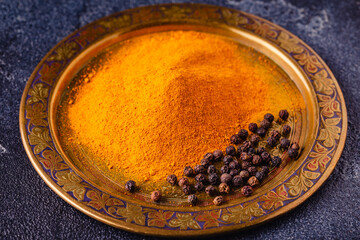 black peppers and turmeric powder