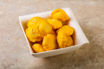 Marinated patissons in the bowl