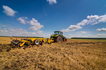 tractor with a disc cultivator, a system for processing soil, pruning and processing of crop...
