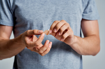 man holding plaster in hands treatment help