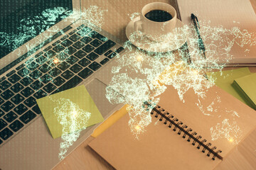 Double exposure of social network drawing and desktop with coffee and items on table background. Concept of international connection.