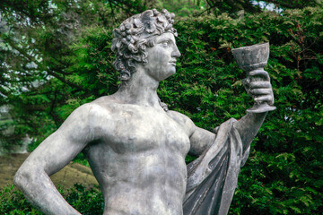 Sculpture of a Bacchus drinking from a goblet at Hardwick Hall, Derbyshire, England