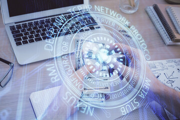 Multi exposure of technology drawing hologram and us dollars bills and man hands. Data concept