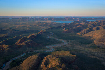 A beautiful view of El Questro Mountain range and a river from a scenic flight tour, Kimberley,...