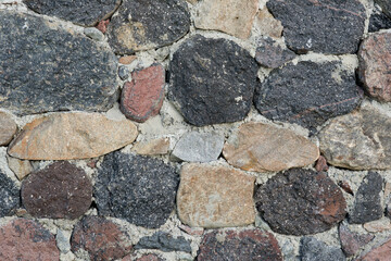 Wall built of natural stone, wall stone texture