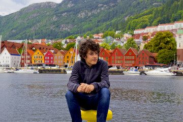 happy boy in bergen city, norway in europe