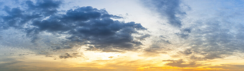 A view of the sunrise sky with clouds.
