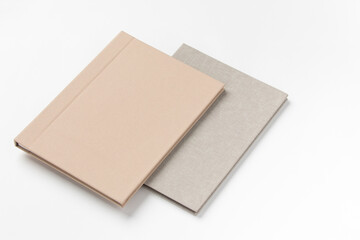 Grey hardcover books, isolated on white background