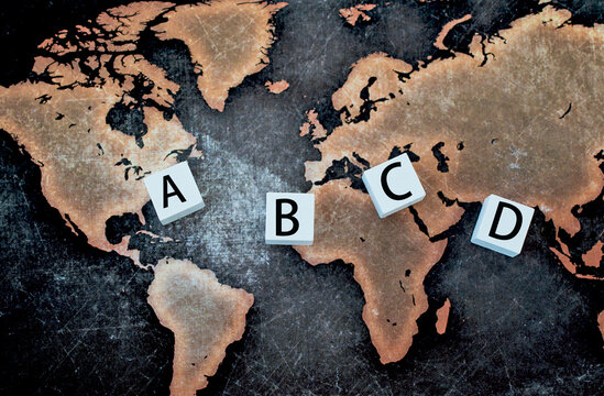 Learning English. Alphabet on white cube with world map	