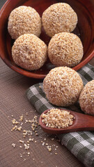 Amarnath seed, Cholai or Rajgira laddo, Also in cube shape called chikki or cake form, Indian sweet and healthy food served in a plate and bowl. Selective focus.
