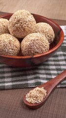 Amarnath seed, Cholai or Rajgira laddo, Also in cube shape called chikki or cake form, Indian sweet and healthy food served in a plate and bowl. Selective focus.