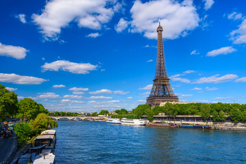 Paris Eiffel Tower and river Seine in Paris, France. Eiffel Tower is one of the most iconic...