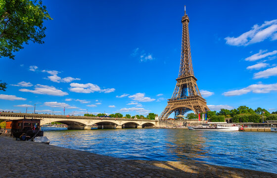 Paris Eiffel Tower and river Seine in Paris, France. Eiffel Tower is one of the most iconic landmarks of Paris. Cityscape of Paris