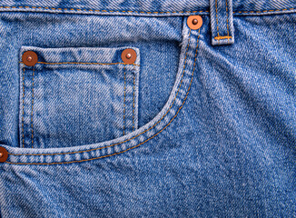 Small jeans pocket close-up. Denim in classic color.