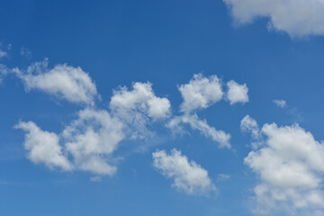 Beautiful white clouds on blue sky background