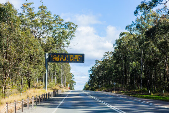 covid stay at home orders in force overhead sign on highway in NSW