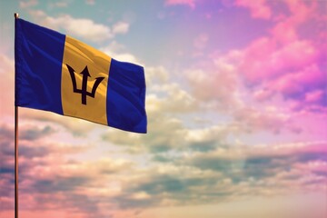 Fluttering Barbados flag mockup with the space for your content on colorful cloudy sky background. - obrazy, fototapety, plakaty