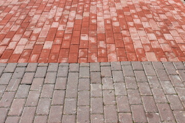 Old and new stones on the road. Russia.