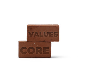 Core values words engraved on red brick. Business concept.