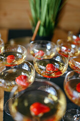 Wedding cocktails with strawberries on the table
